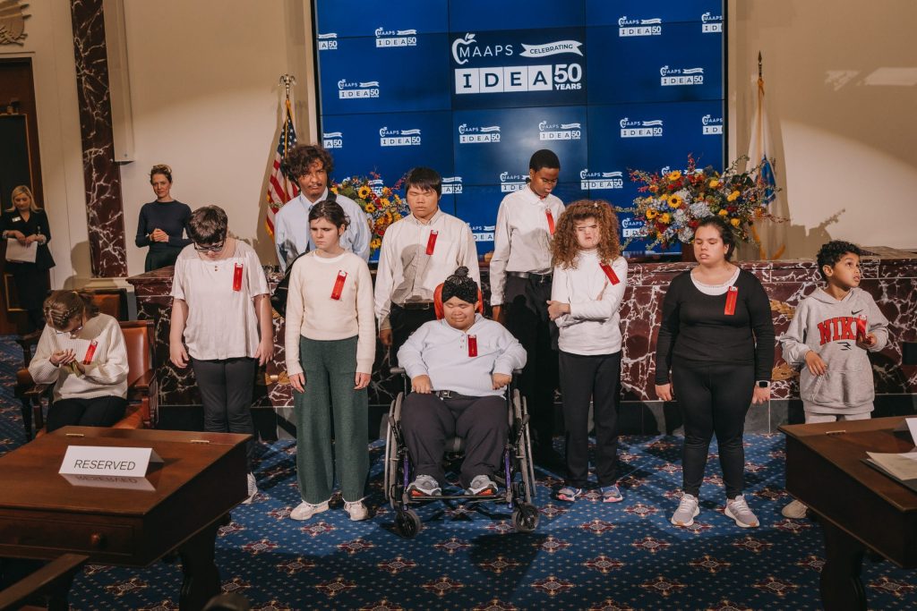 Student Ambassadors from Perkins School for the Blind Chorus, who performed "From A Distance"